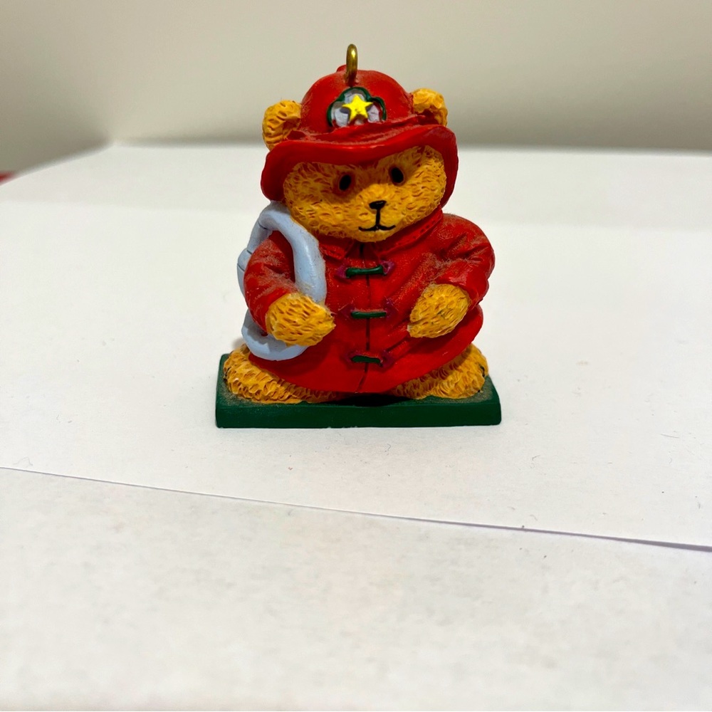 1997  Avon Gift Collection Holiday Package Topper Fireman Ornament